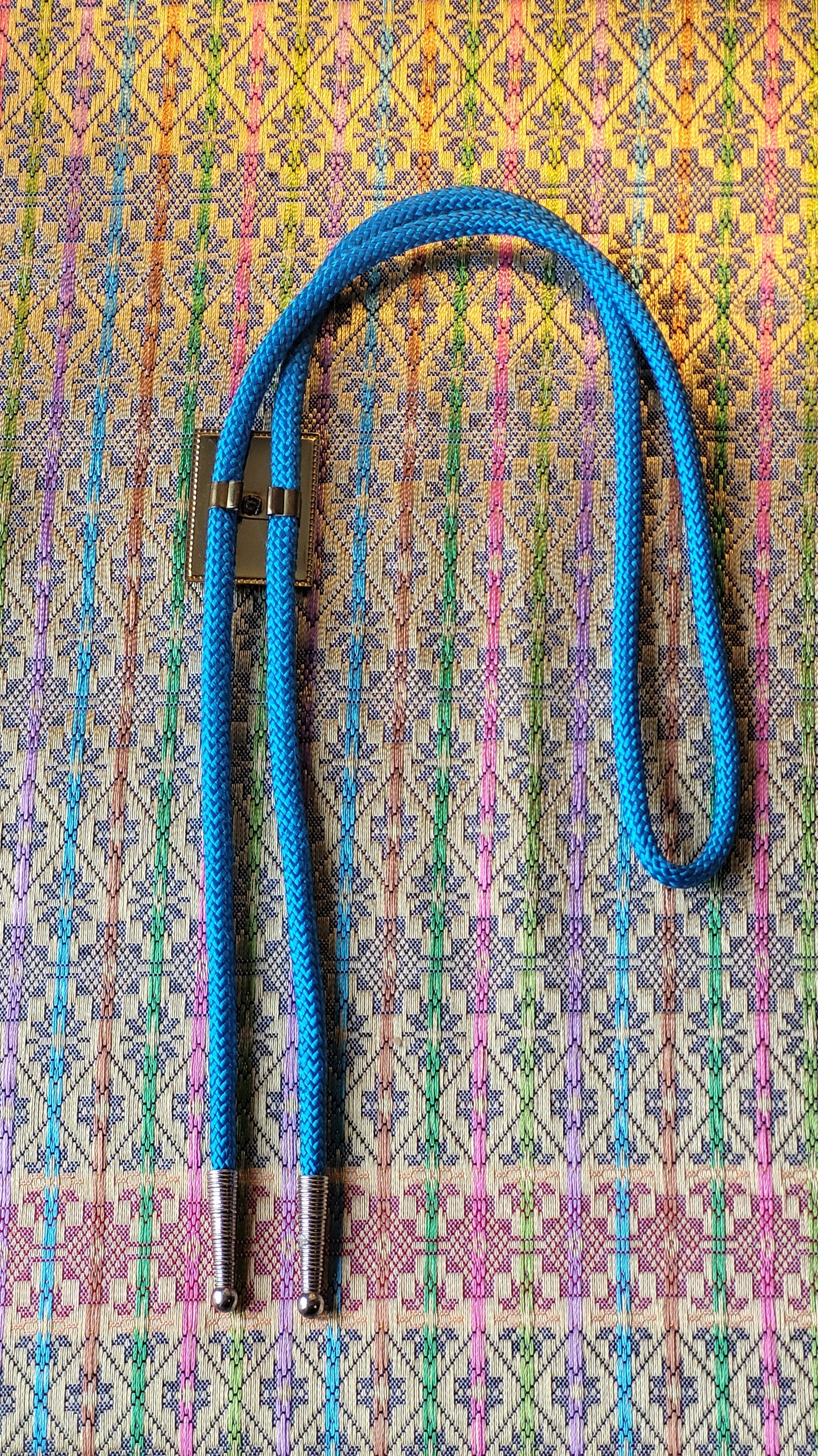 Saddle with Turquoise Cord Bolo Tie